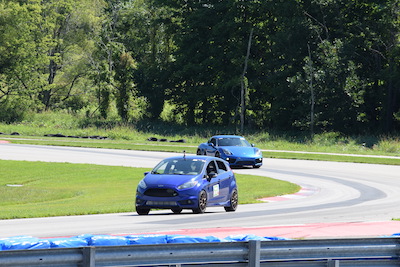 Putnam Park Road Course AutoInterests HPDE Ford Focus and Porsche driving on track